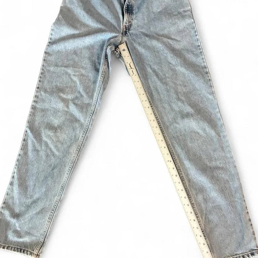 Vintage/Y2K 1999 Levi's 550 relaxed fit/tapered leg light wash 100% rigid cotton